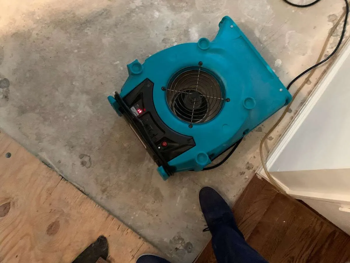 Air mover drying subfloor during Leak Detection & Repair in East Bakersfield